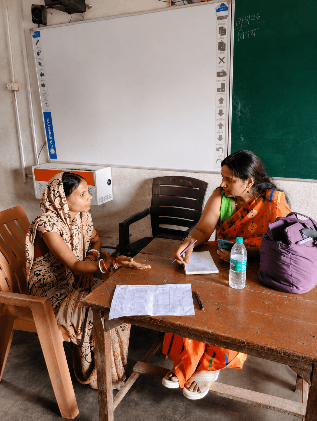 Medical professionals interacting with patients during a community camp