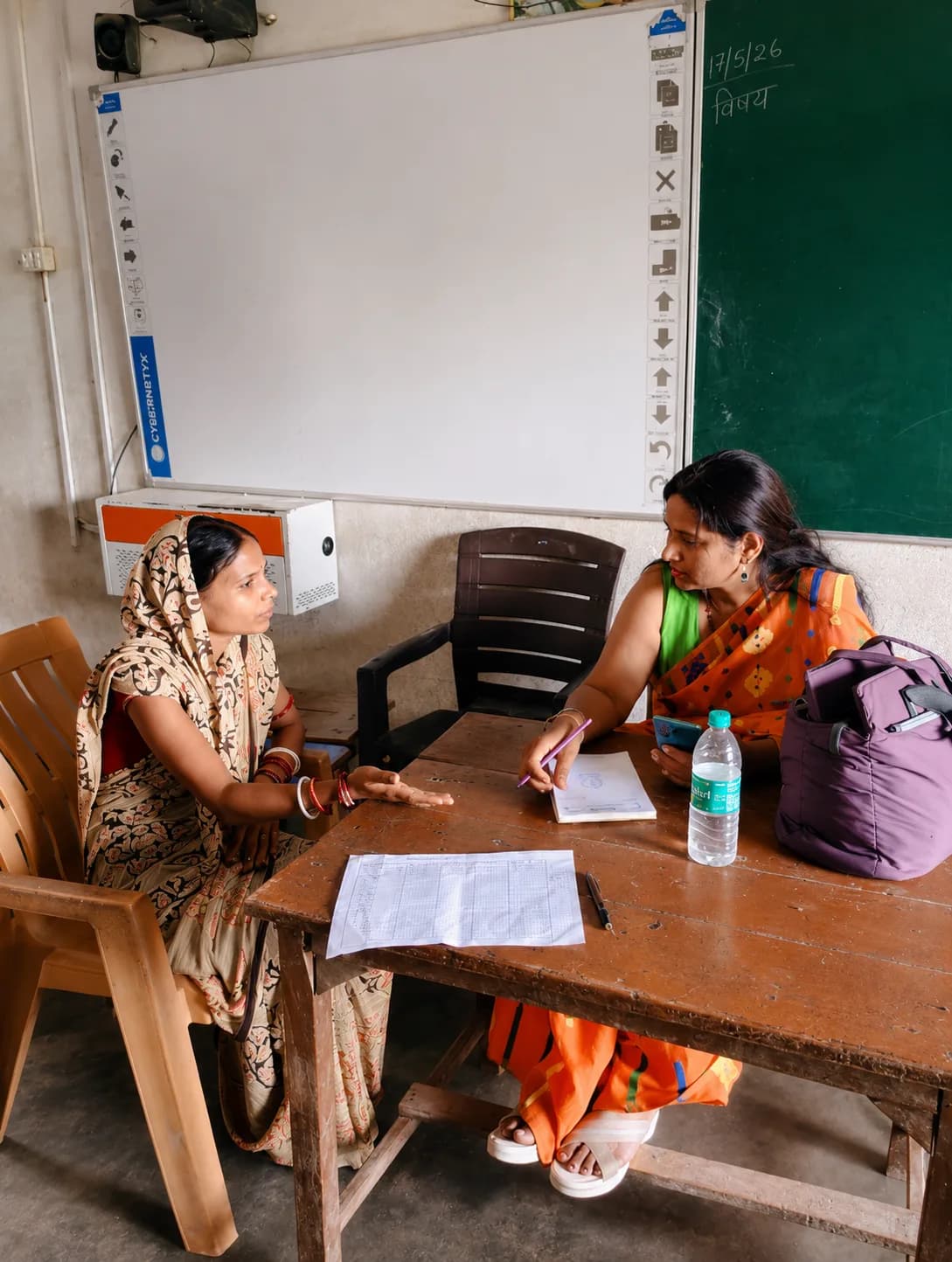 Medical professionals interacting with patients during a community camp